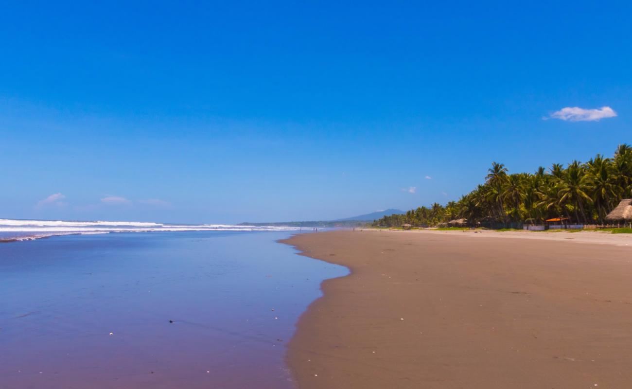 Photo de Los Caracoles beach avec sable gris de surface