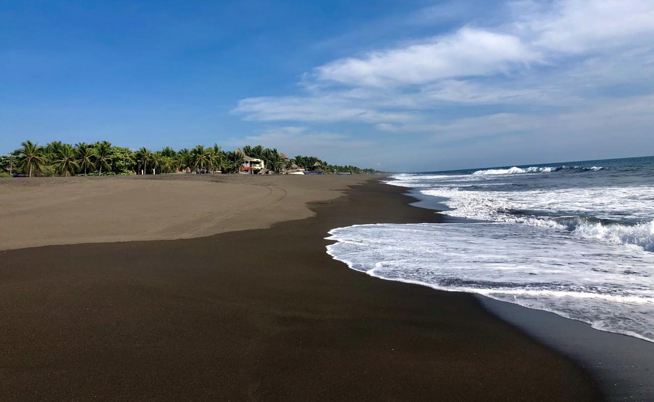 Photo de Playa de Monterrico avec sable brun de surface