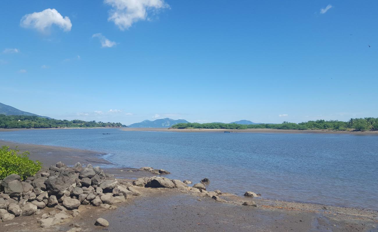 Photo de Playa El Tamarindo avec sable lumineux de surface