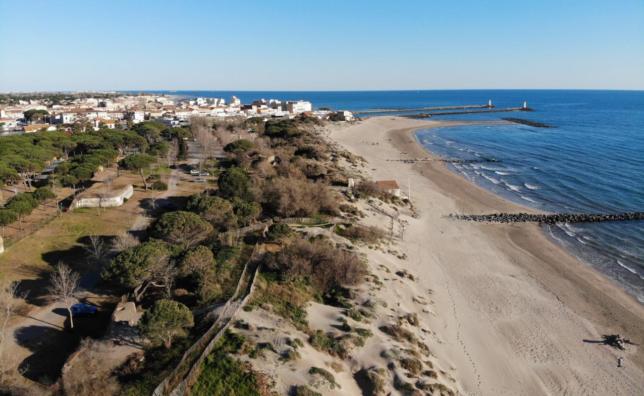 Photo de Tamarissiere beach avec sable fin et lumineux de surface