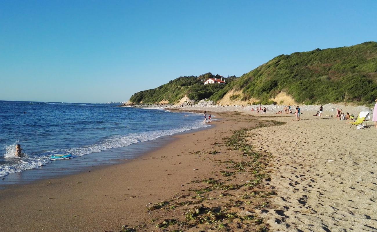 Photo de Plage de Senix avec sable clair avec caillou de surface