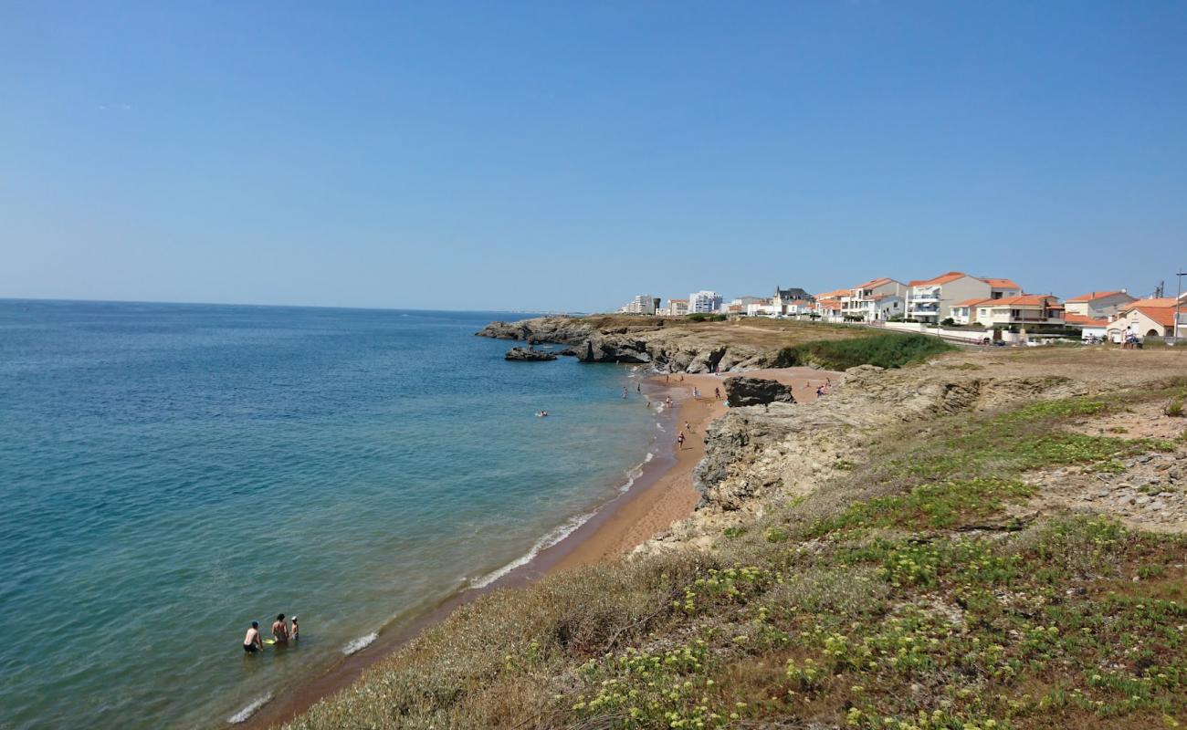 Photo de Bussoleries beach avec sable beige & pierres de surface