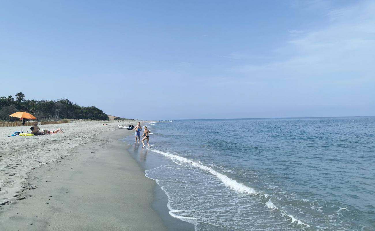 Photo de Cap Sud Beach avec sable lumineux de surface