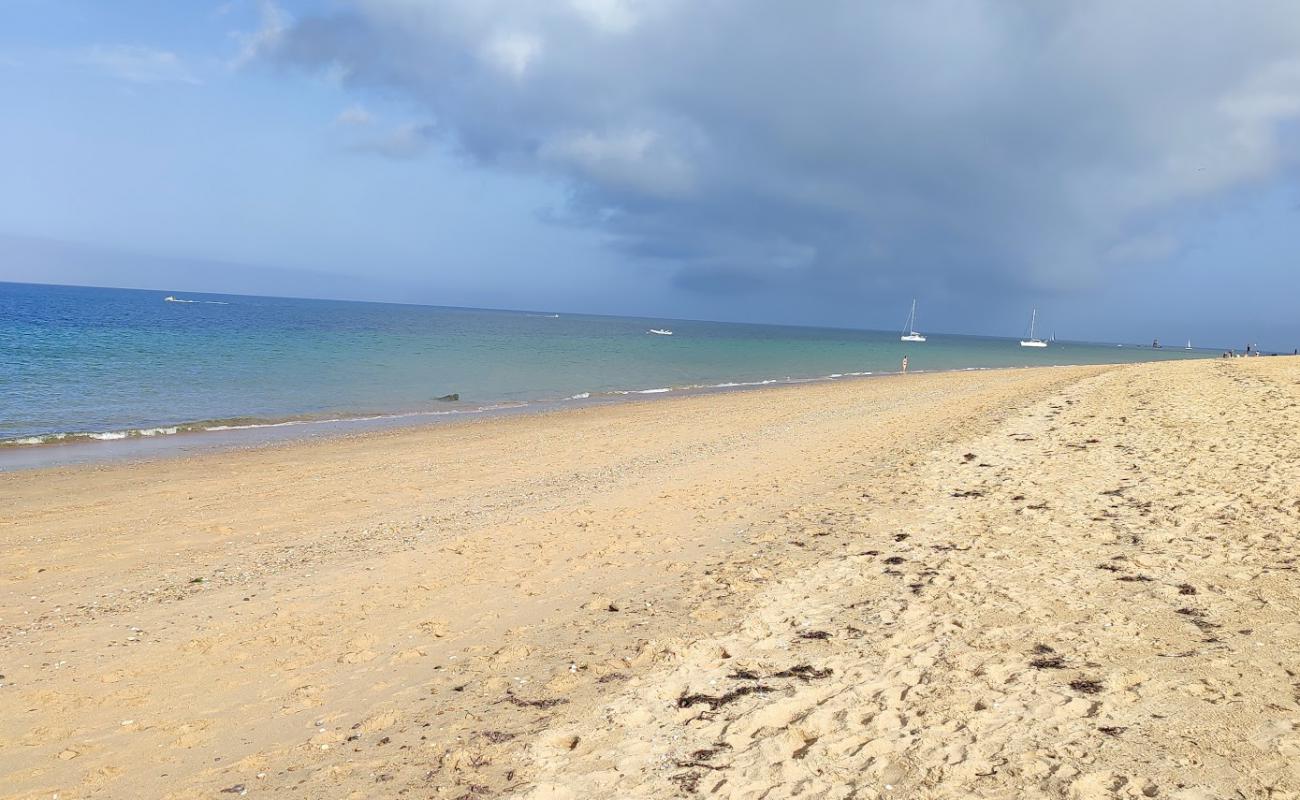 Photo de La Grande Conche Beach avec sable beige de surface