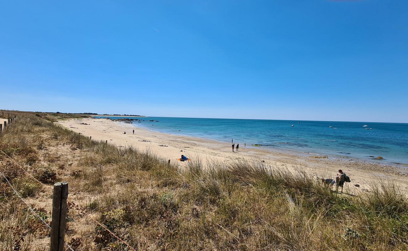 Photo de Lutins Beach avec sable lumineux de surface