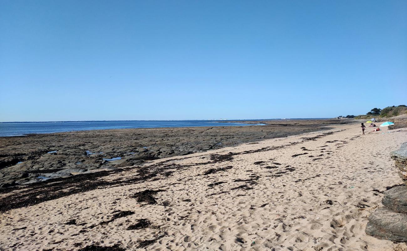 Photo de St. Gildas Beach avec sable lumineux de surface