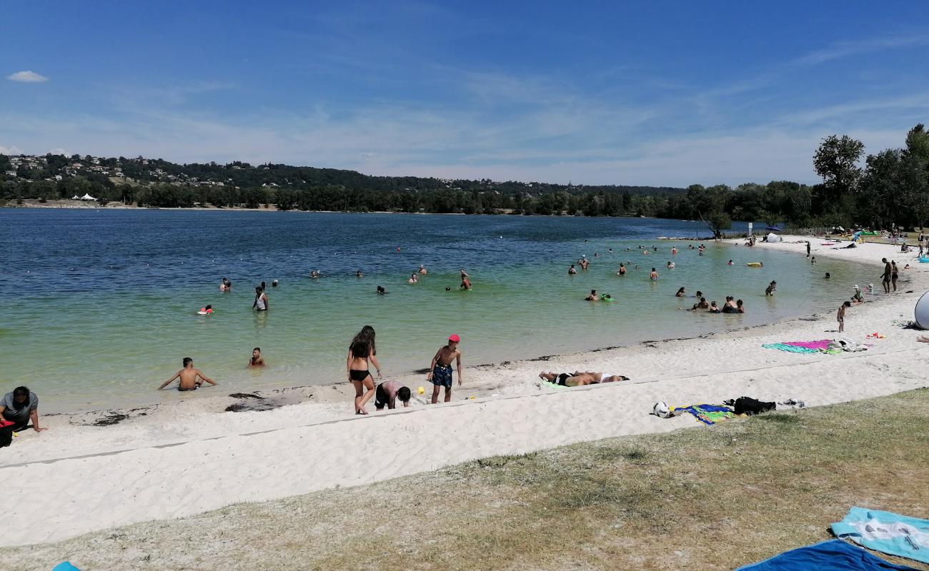 Photo de L'atol Beach avec sable beige de surface