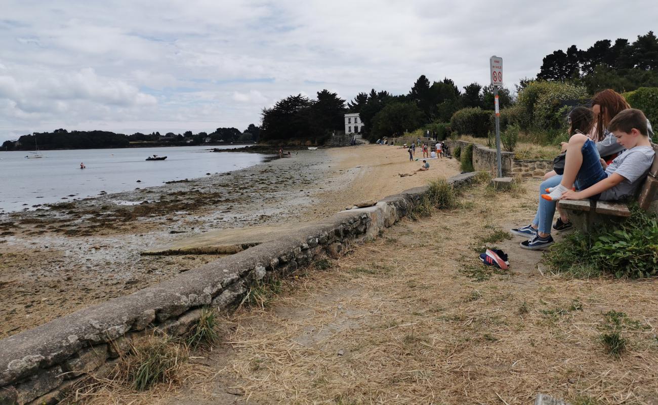 Photo de Port Miquel Beach avec sable beige de surface