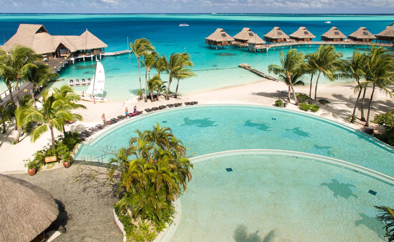 Photo de Plage Conrad Bora Bora avec sable fin blanc de surface