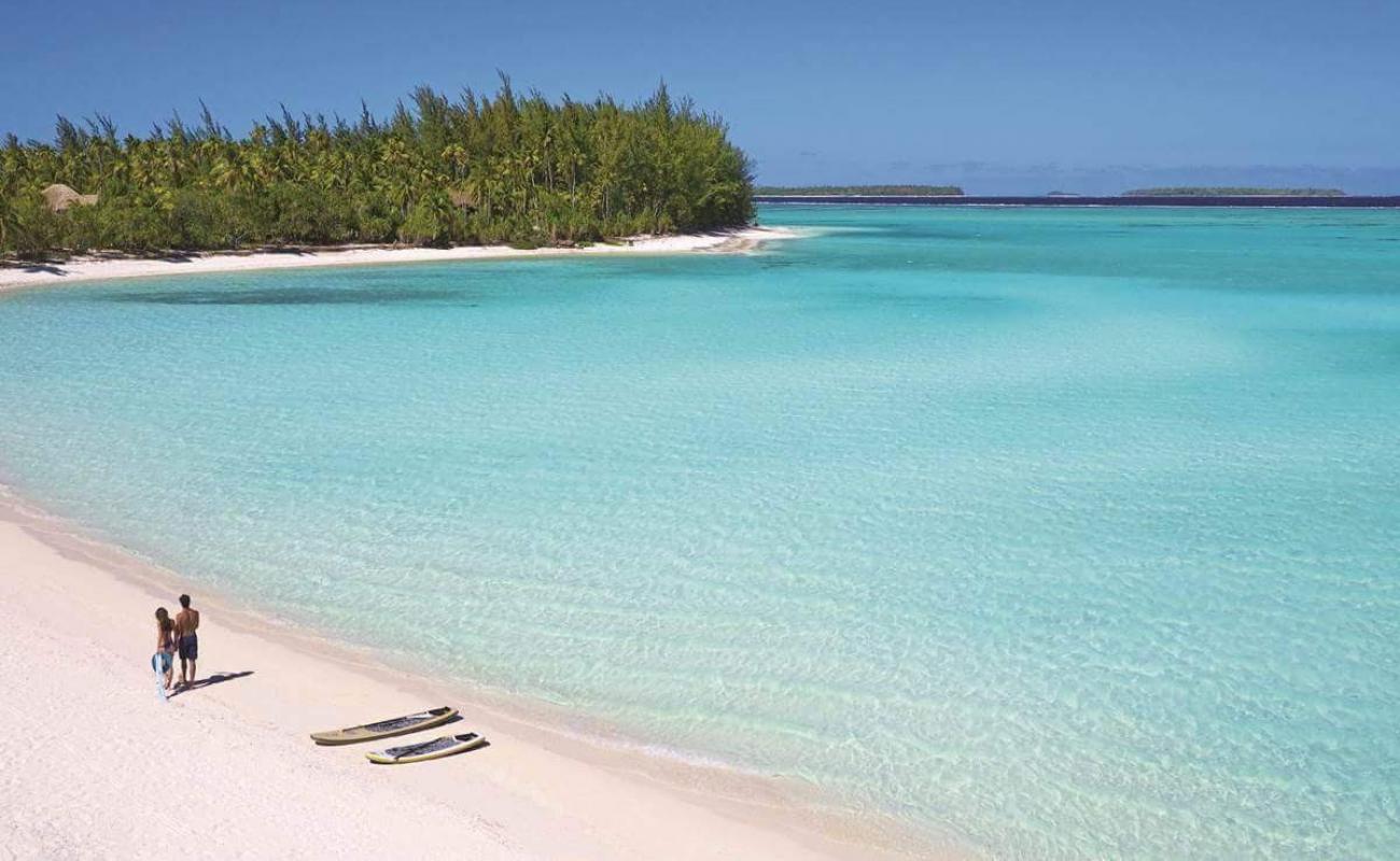 Photo de Plage de l'île Onetahi avec sable fin blanc de surface