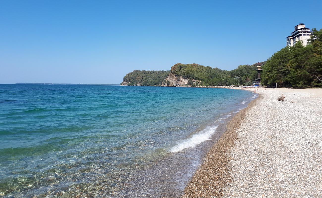 Photo de Miussera beach avec sable clair avec caillou de surface