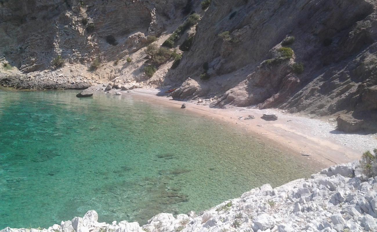 Photo de Minas scr. beach III avec galets beige de surface