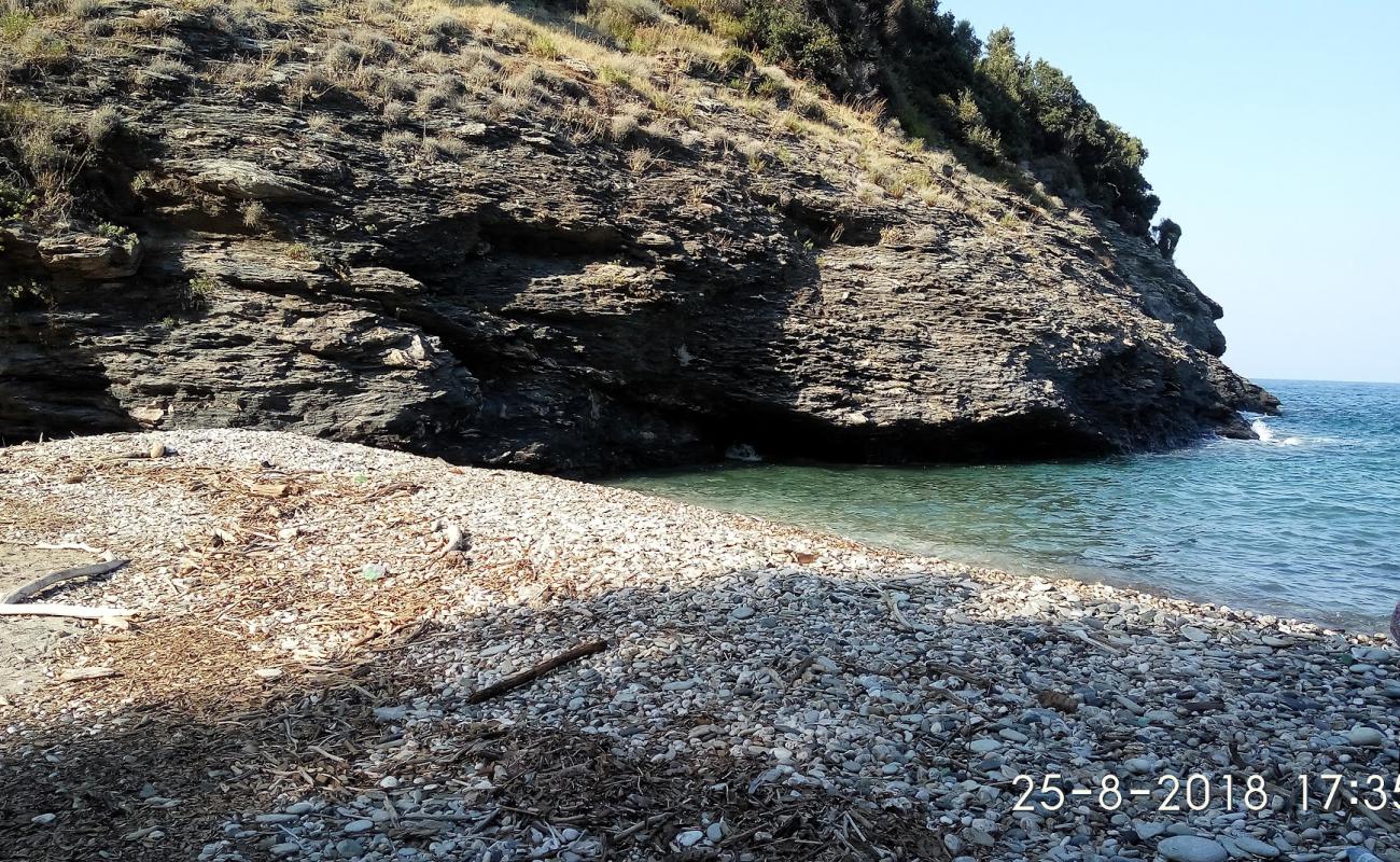 Photo de Placa wild beach avec sable beige & galets de surface