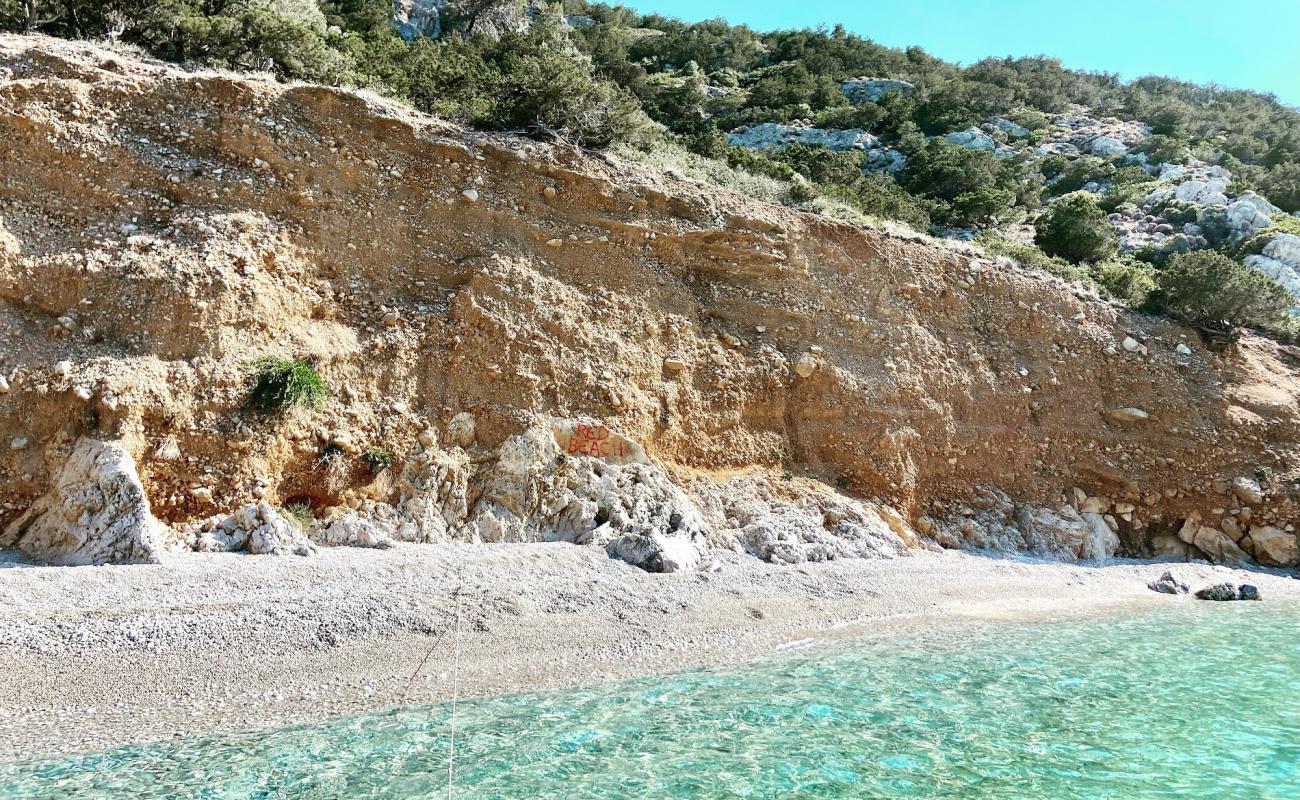 Photo de Porto Germeno secret beach avec galets gris de surface
