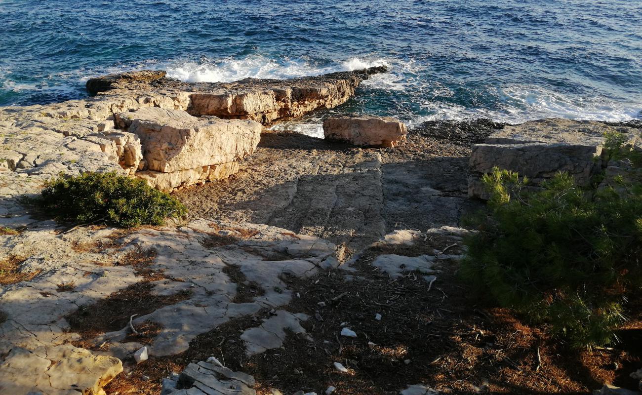 Photo de Inviaggioconale beach avec roches de surface