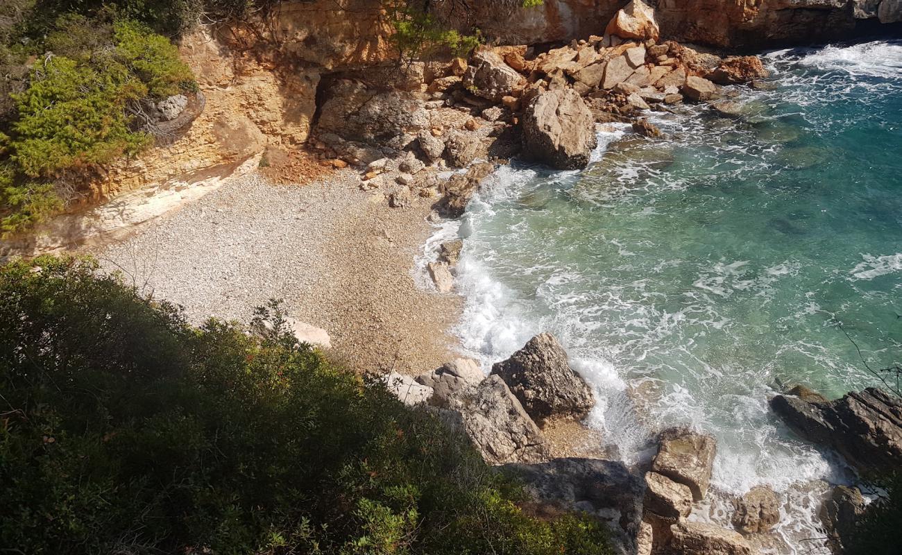 Photo de Alex beach avec galets bruns de surface