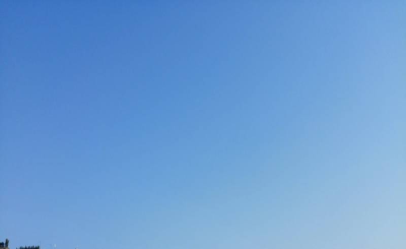 Photo de Livadi Beach avec sable brun de surface