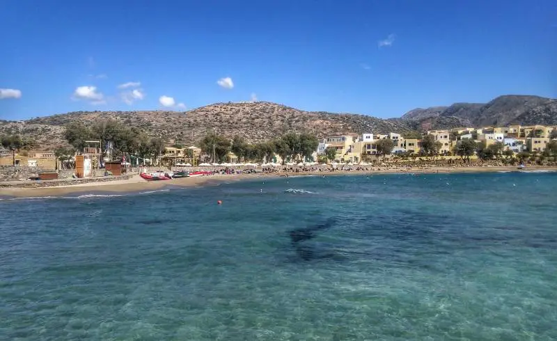 Photo de Paralia Kalimera avec sable brun de surface