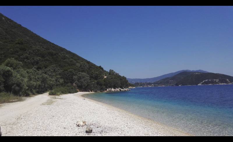 Photo de Kamari Beach avec caillou clair de surface