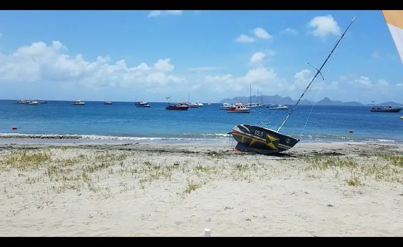 Photo de Petite Martinique beach avec sable beige de surface