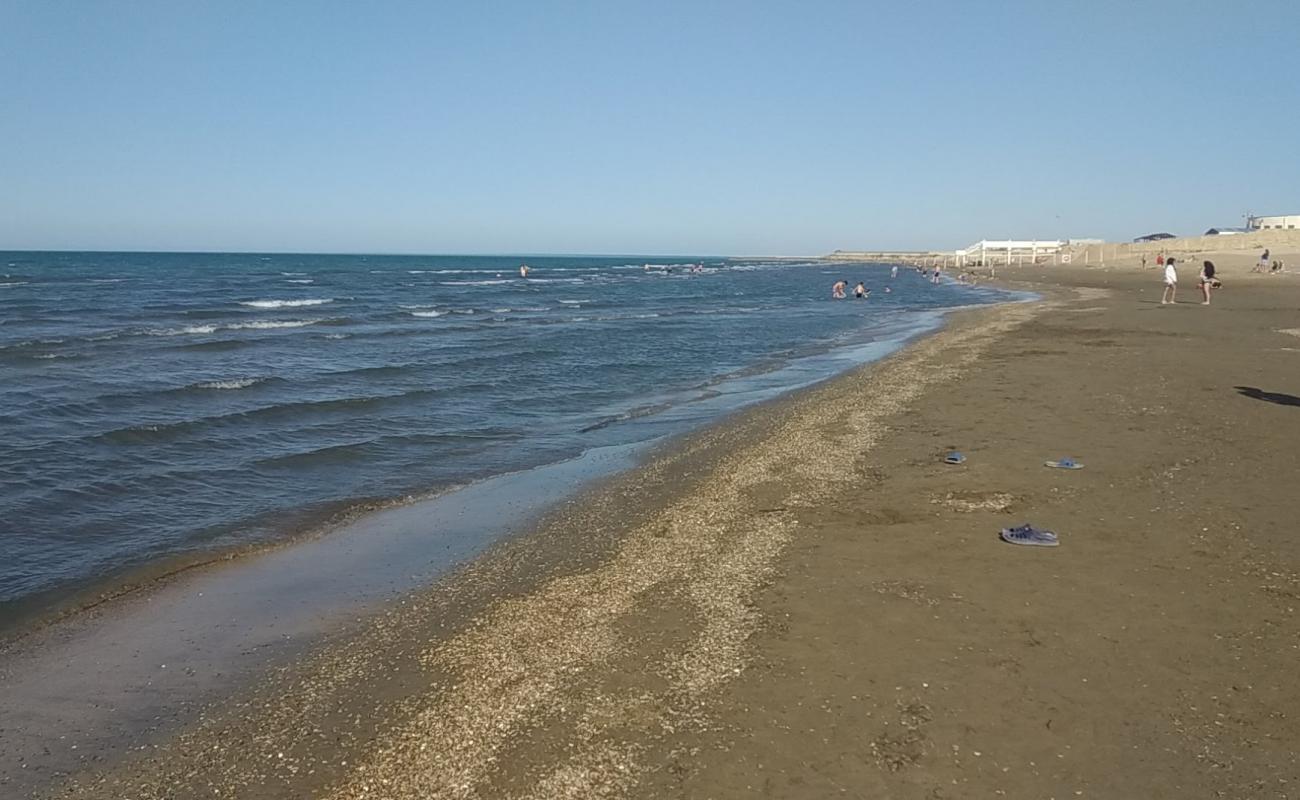 Photo de FHN Beach avec sable beige de surface