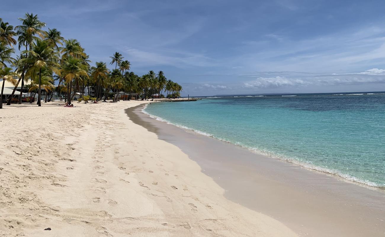 Photo de The Beach of Caravelle avec sable fin et lumineux de surface