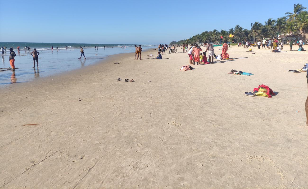 Photo de Malpe Beach avec sable lumineux de surface