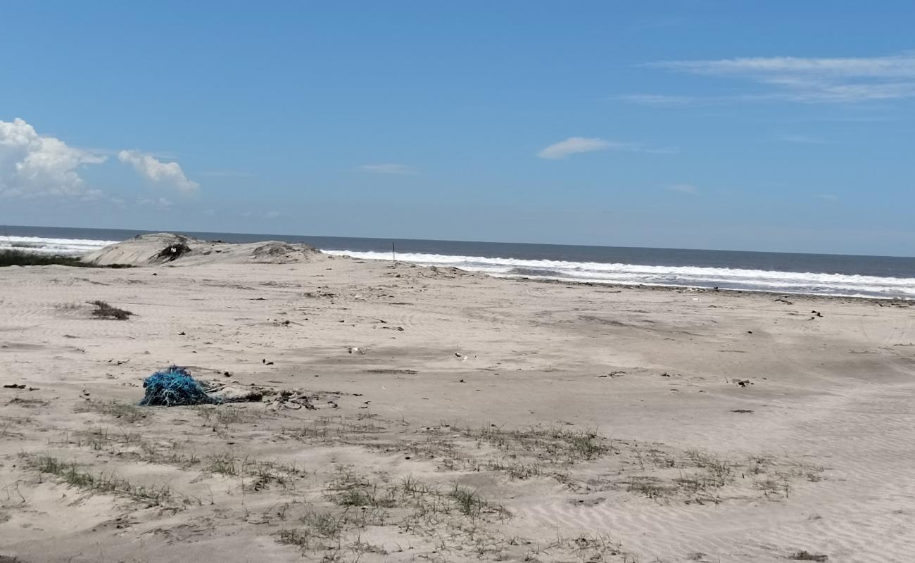 Photo de Crab Beach avec sable lumineux de surface