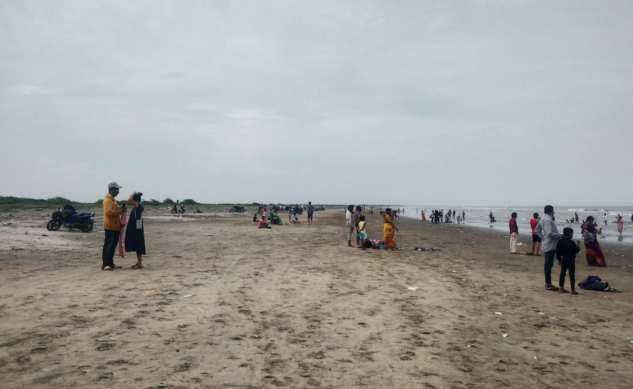 Photo de Manginapudi Beach avec sable fin et lumineux de surface