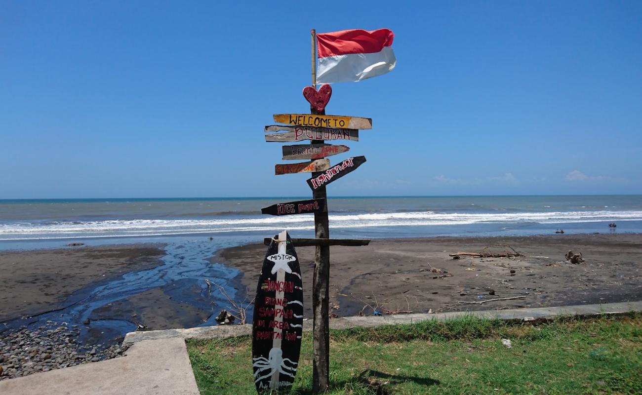 Photo de Pangkung Jukung Beach avec sable brun de surface