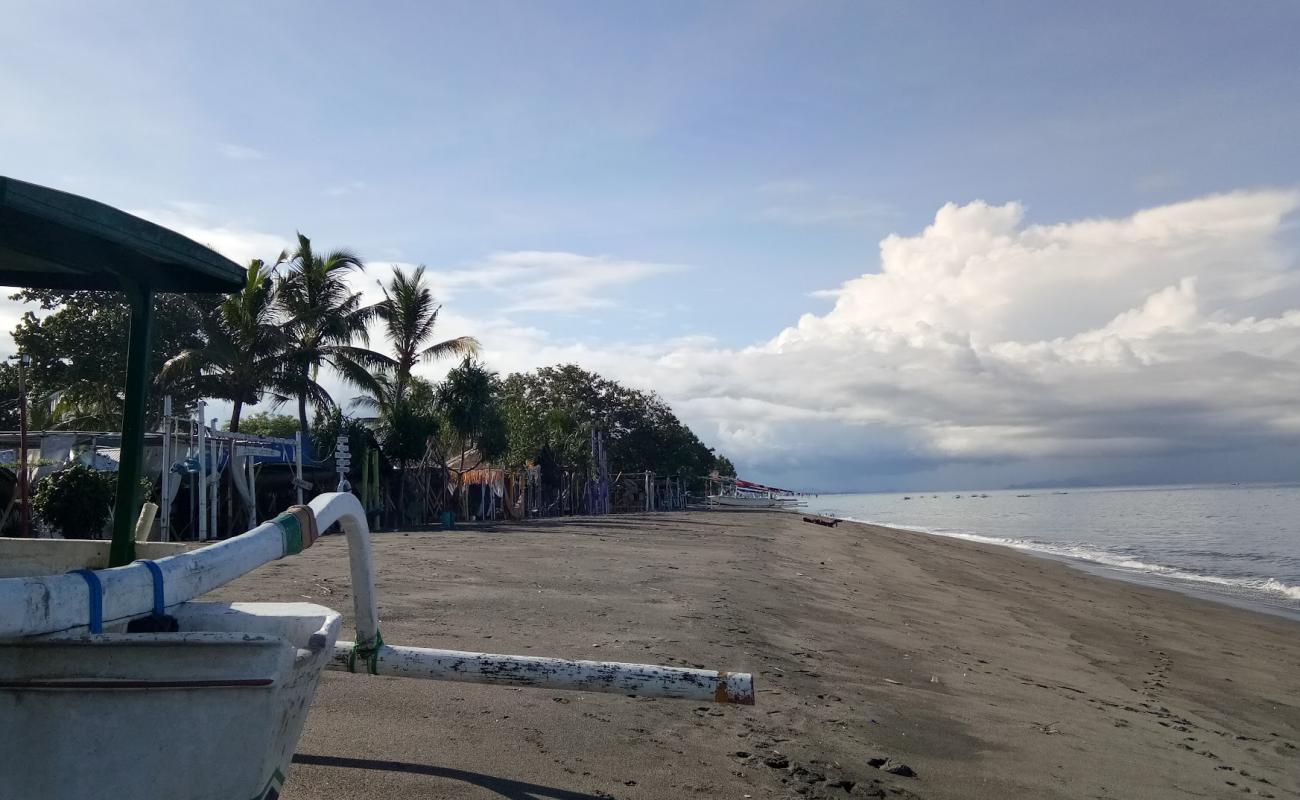 Photo de Kedai Pesona Tanjung Bias avec sable brun de surface