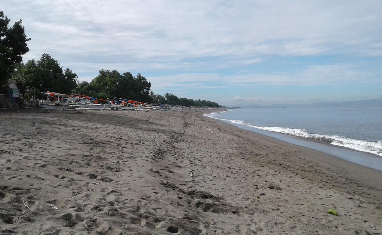 Photo de Montong Beach avec sable brun de surface