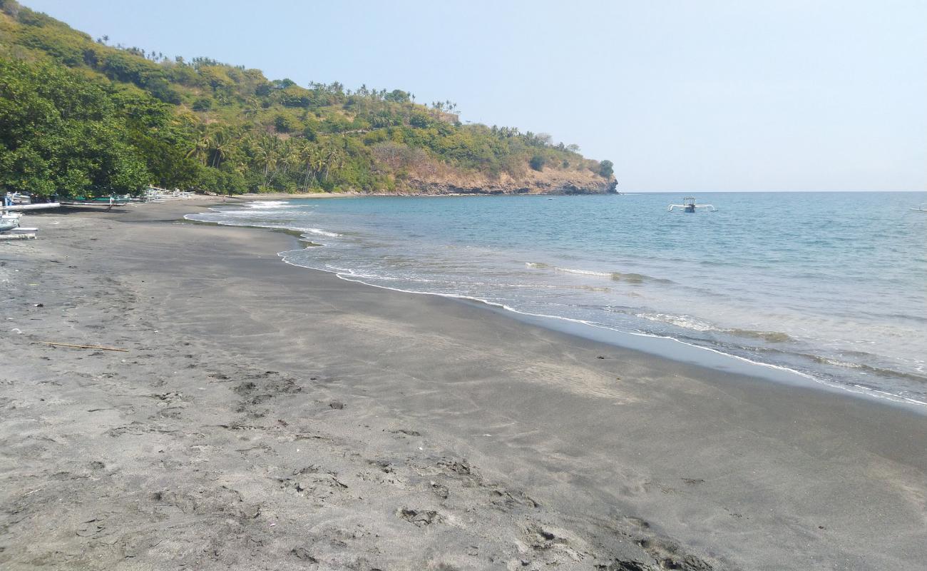 Photo de Pantai malimbu avec sable lumineux de surface