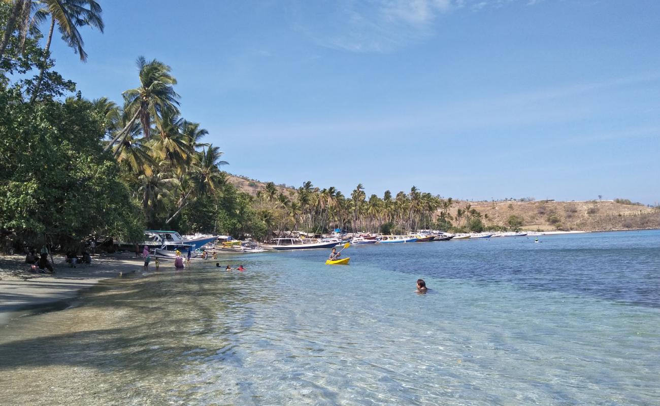 Photo de Mentigi beach avec sable beige & galets de surface