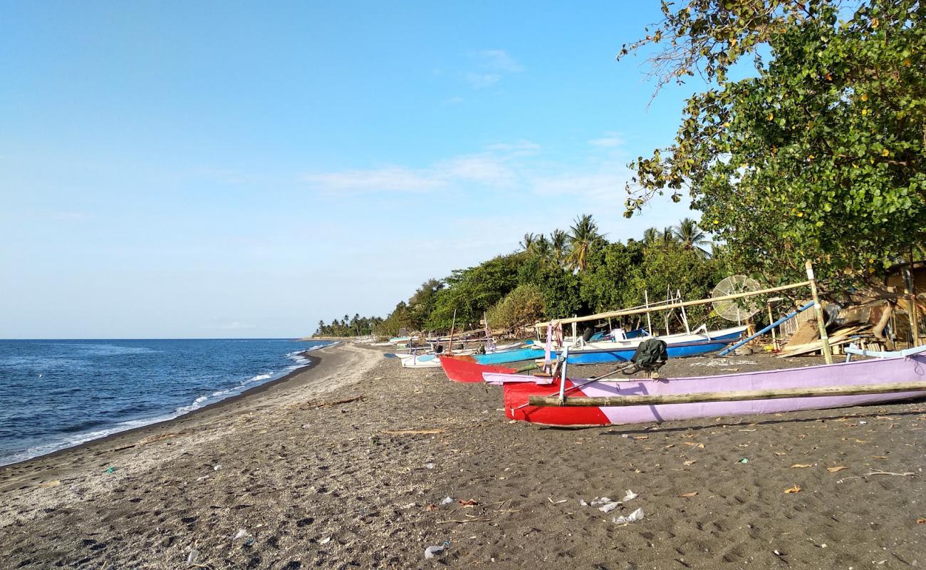 Photo de Ketapang Tampes beach avec sable brun de surface