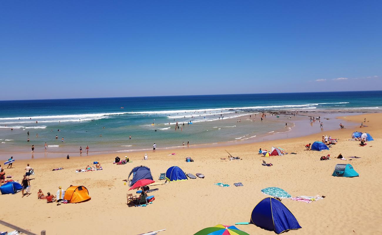Photo de Gunnamatta Ocean Beach avec sable beige de surface