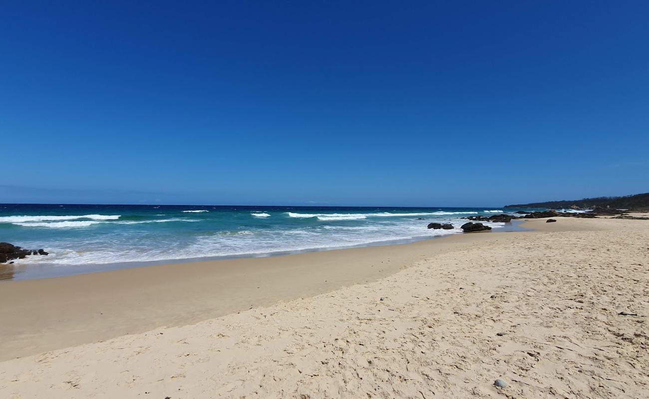 Photo de Quarry Beach avec sable beige de surface