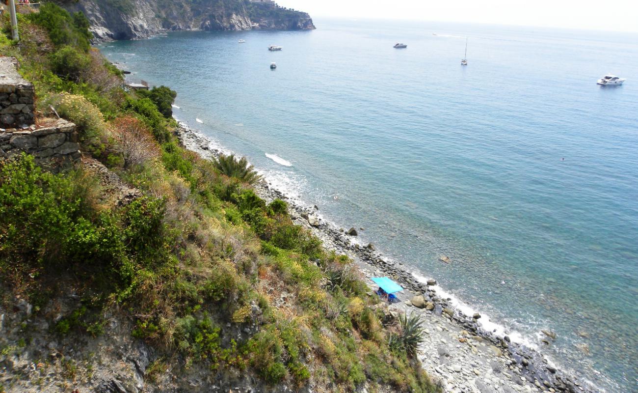 Photo de Spiaggia di Guvano Vernazza avec roches de surface