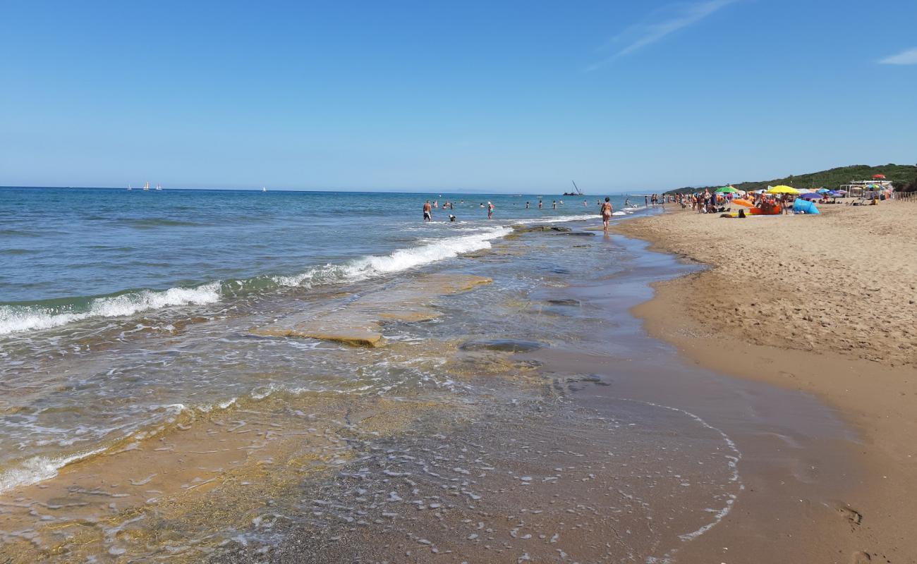 Photo de Spiaggia di Rimigliano avec sable brun de surface