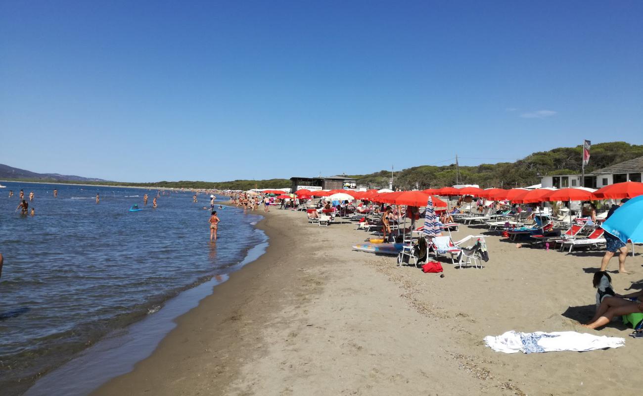 Photo de Al Cartello beach avec sable brun de surface