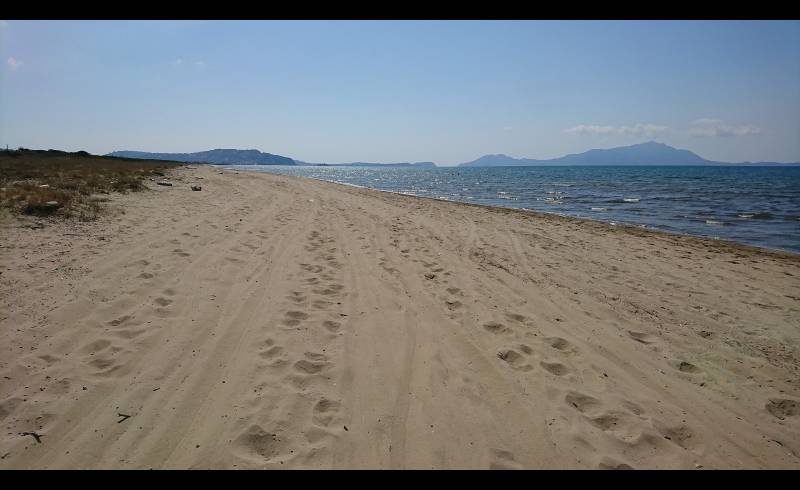 Photo de Spiaggia Romana avec sable beige de surface