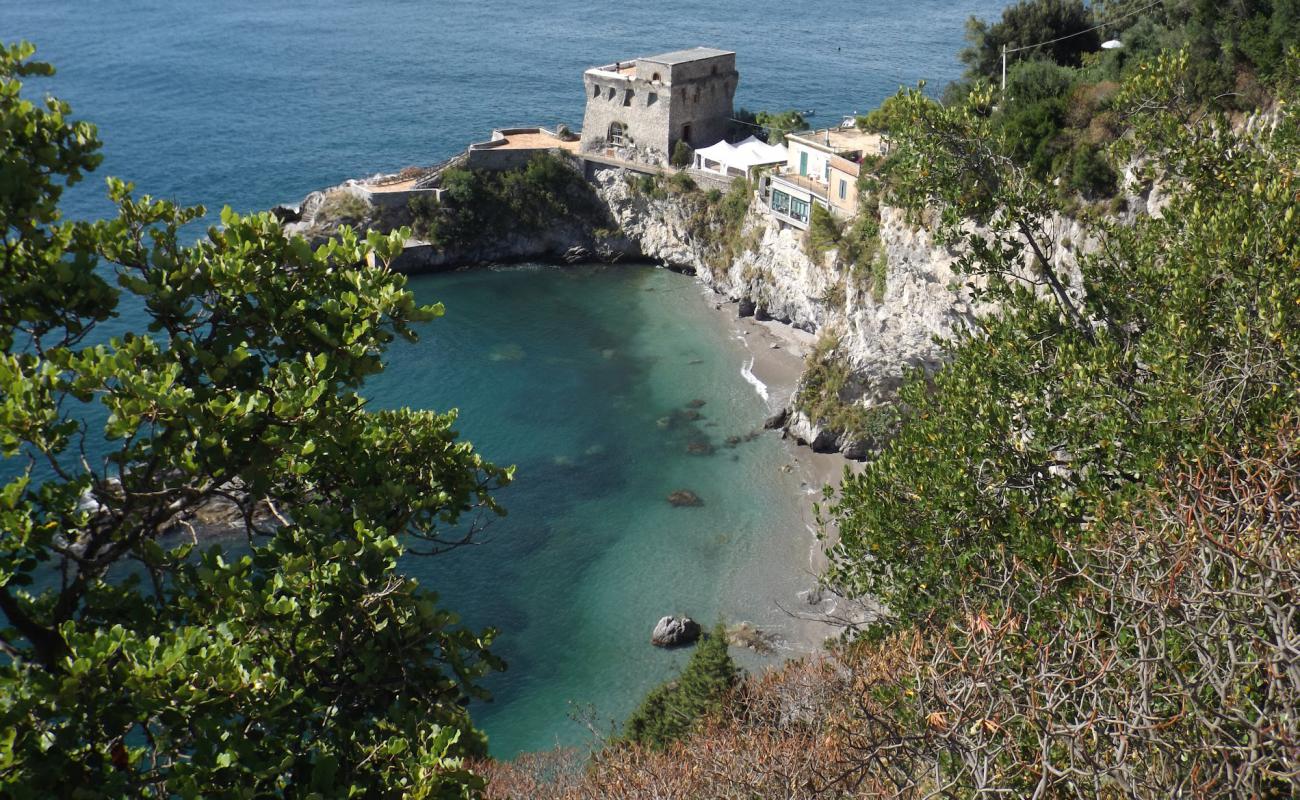 Photo de Spiaggia del Cauco avec caillou fin gris de surface