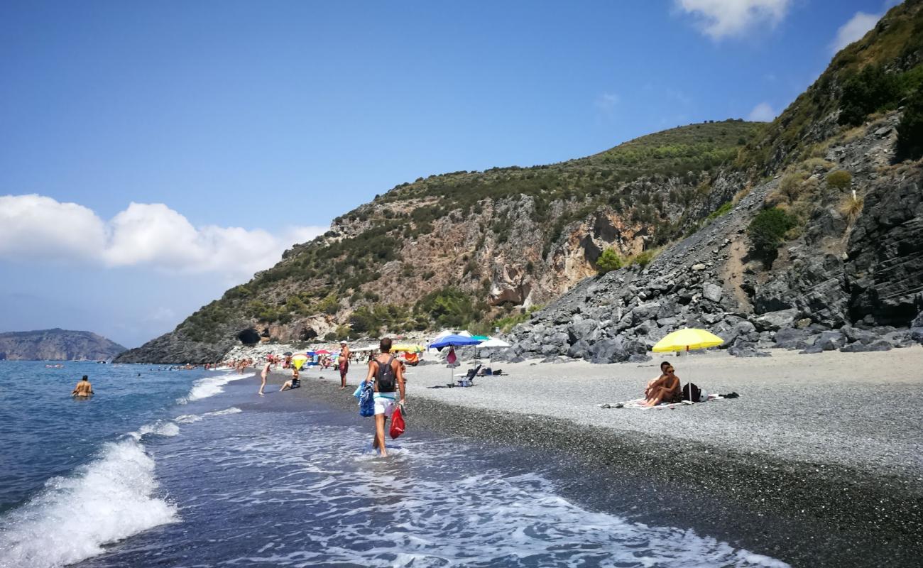 Photo de Spiaggia del Troncone avec sable brun de surface