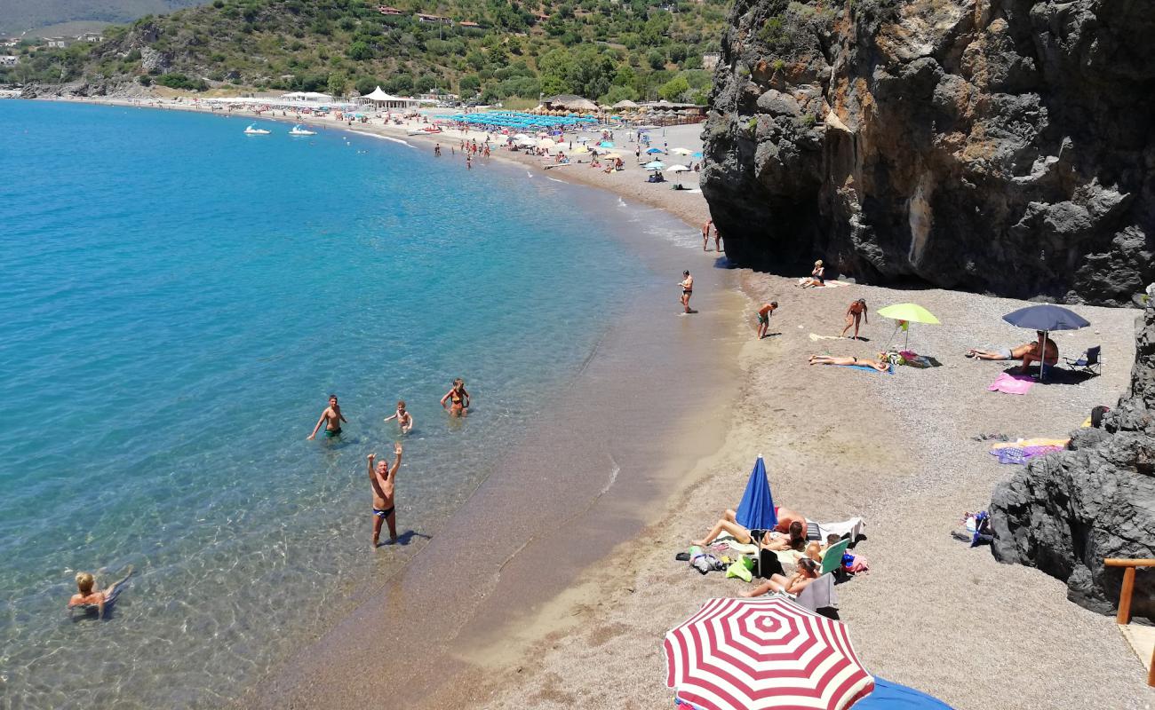 Photo de Spiaggia Lentiscelle avec caillou fin brun de surface