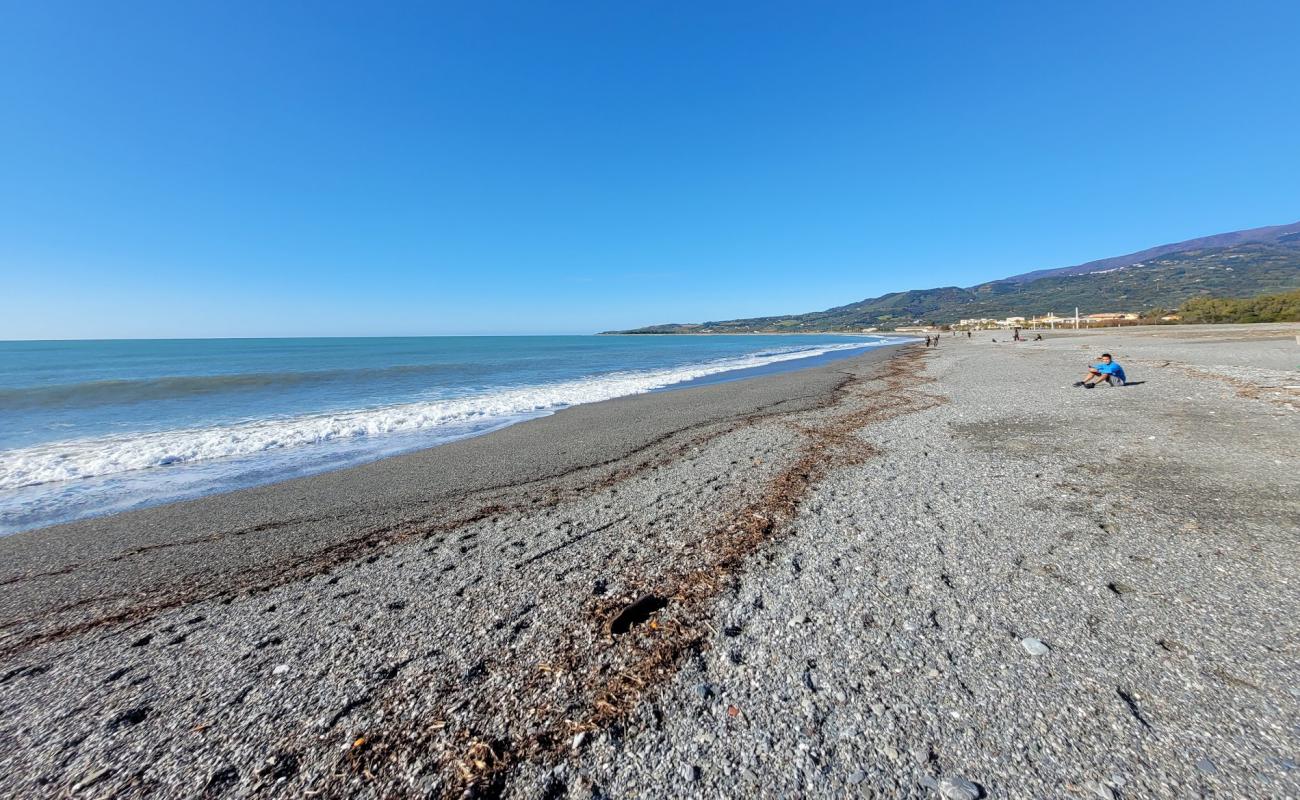 Photo de Spiaggia Cafarone avec caillou fin gris de surface