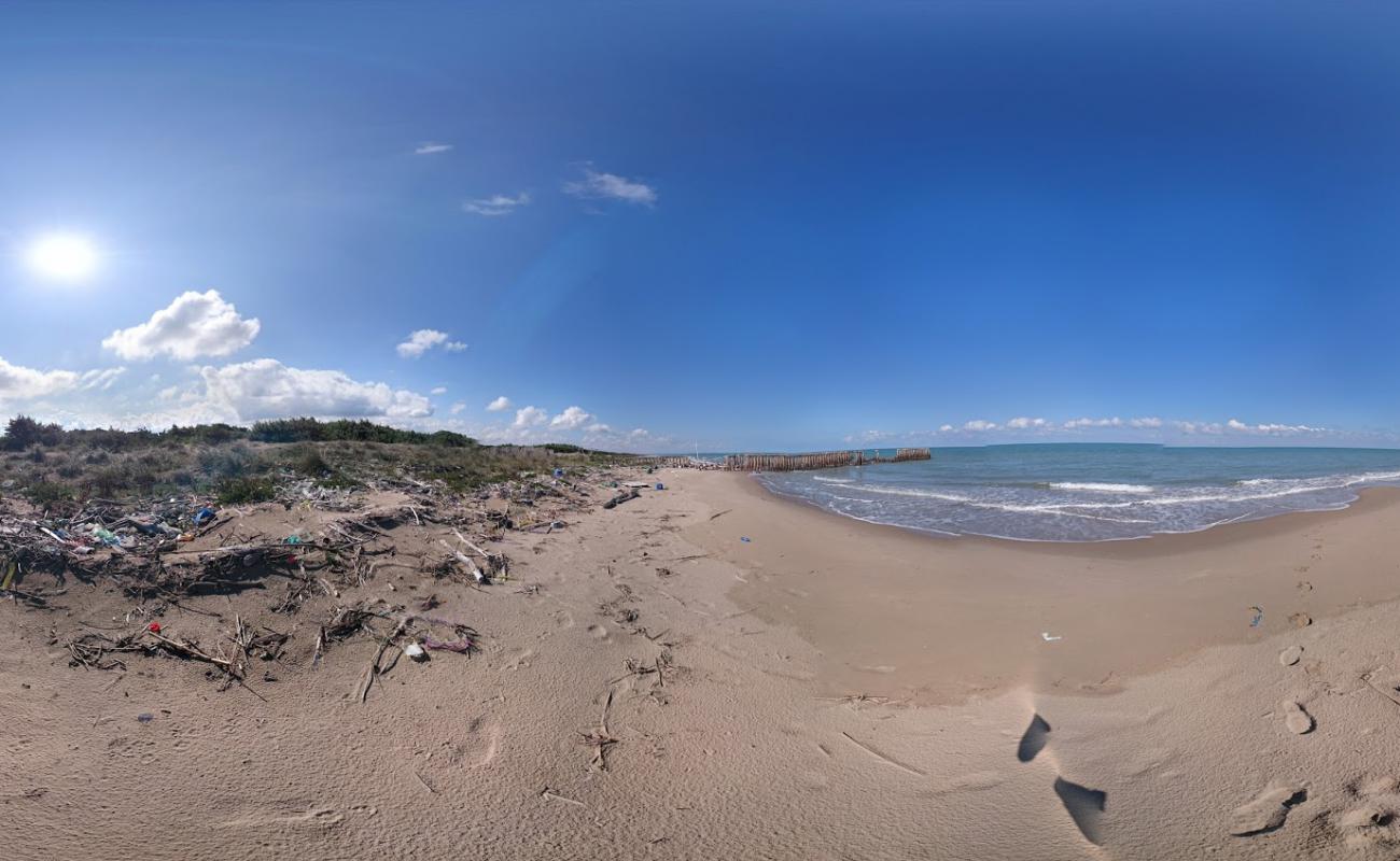 Photo de Spiaggia di Cauto avec sable brun de surface