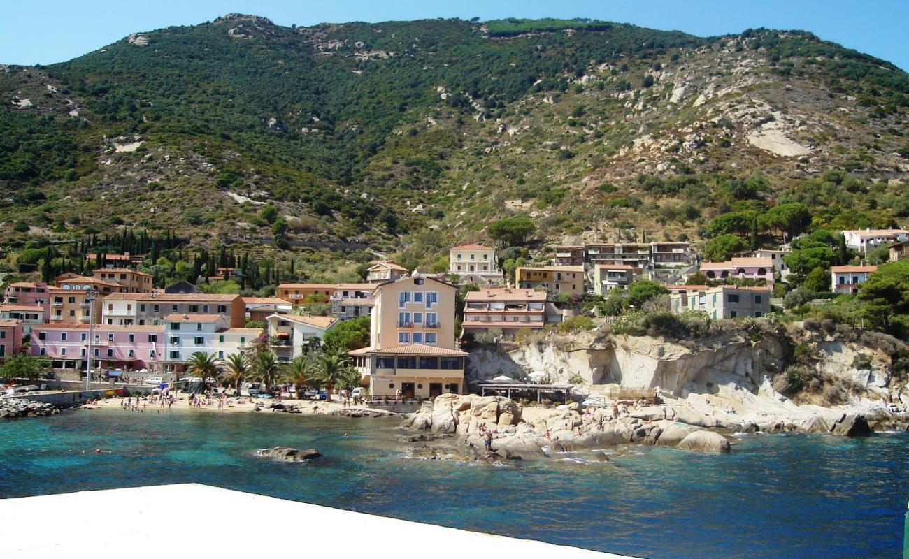 Photo de Cala del Lazzaretto avec sable lumineux de surface