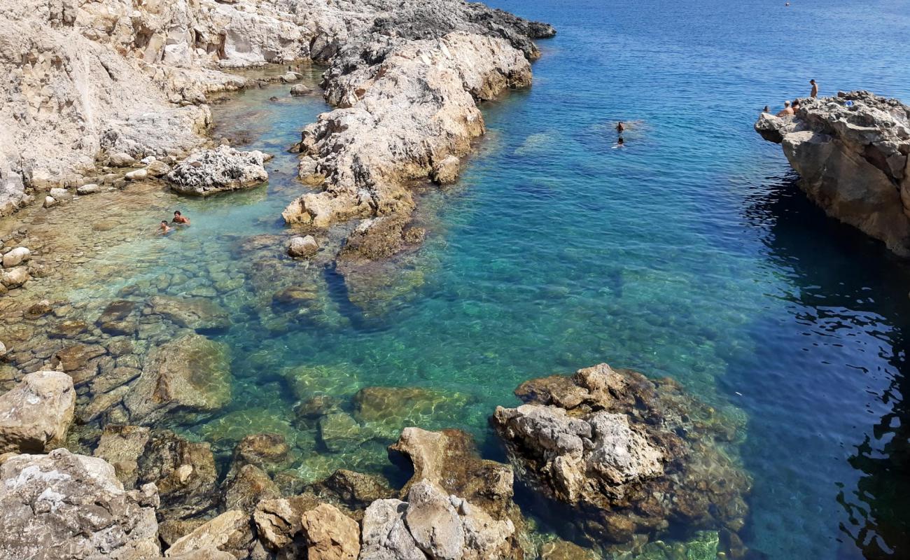 Photo de Lido Cala Zaffiro avec roches de surface