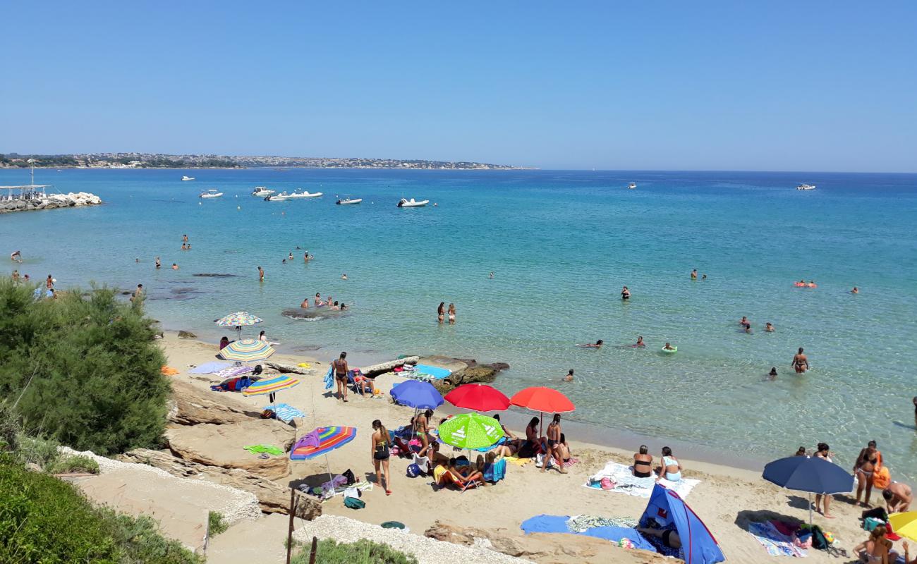 Photo de Argentino Beach avec sable beige & pierres de surface