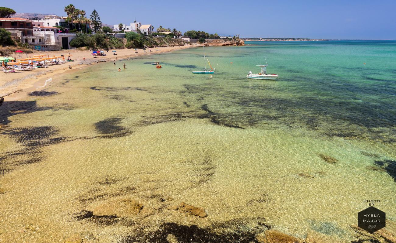 Photo de Spiaggia della Loggia avec sable brun de surface